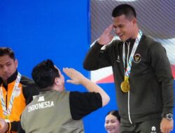 Rizki Juniansyah Dulang Emas dan Pecahkan Rekor Dunia Angkat Besi di SEA Games 2025
